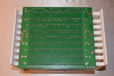 Mounting hardware on the backplane solder side